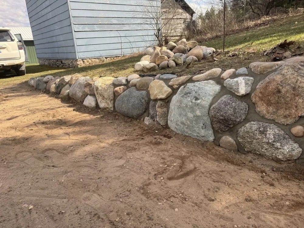 Top-rated landscape installation for year-round maintenance in Alanson, MI by Pecks Landscape and masonry