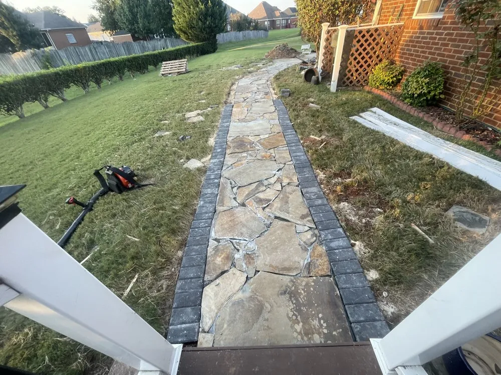 Trusted lawn mowing service with custom design in Huntsville, AL by Pedro Landscaping