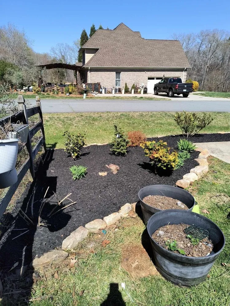 Local garden landscaping for year-round maintenance in Winston-Salem, NC by Pena Lawncare