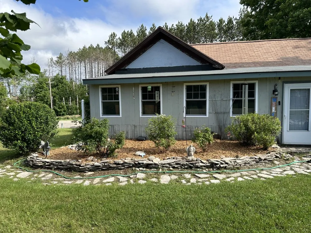 Custom landscape design for residential properties across Kalkaska, MI - Peninsula Lawn Care Services