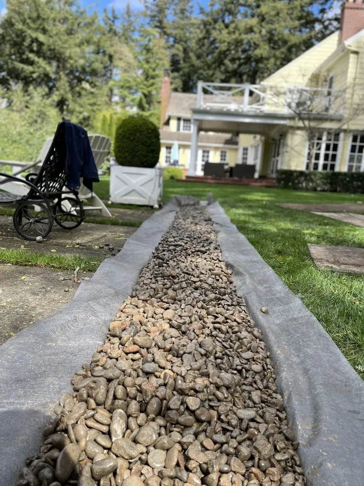 Expert lawn mowing service with custom design in Oregon City, OR by Pensmore landscaping