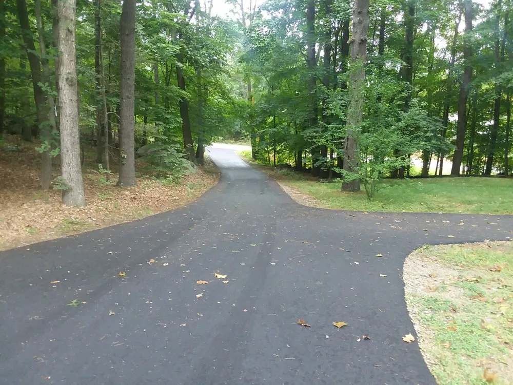 Custom lawn mowing service for beautiful yards in Groveland, MA by Pentucket Paving & Landscaping