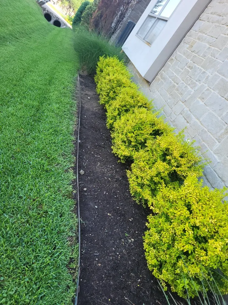 Custom landscape design for residential properties in Mabank, TX by Peralta's Landscaping
