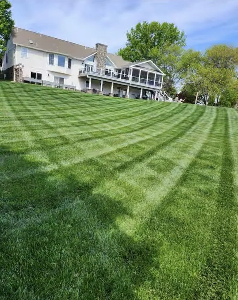 Professional lawn mowing service in Hoffman Estates, IL by Peraza Landscaping
