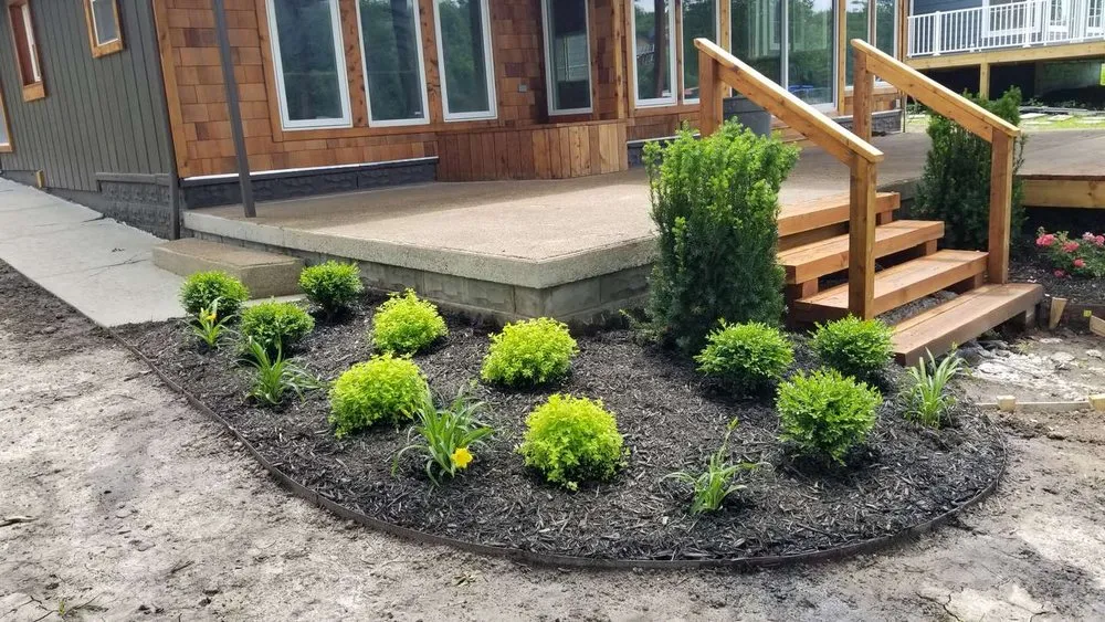 Custom landscape installation with custom design across Kansas City, MO - Perez Landscape and Trees