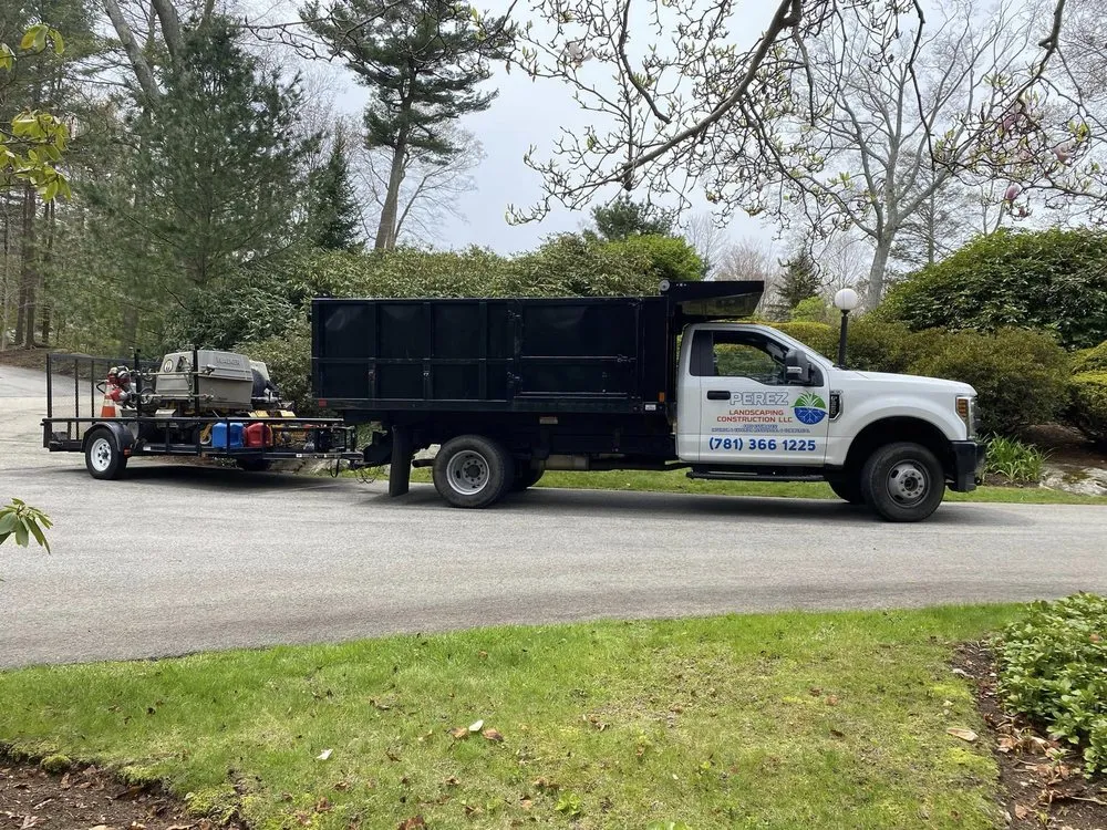 Custom lawn mowing service for residential properties in Lynn, MA by Perez Landscaping & Construction