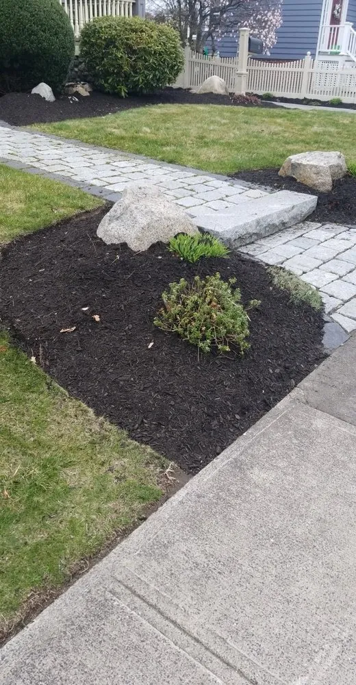 Reliable yard maintenance for year-round maintenance in Boston, MA by Perez Landscaping
