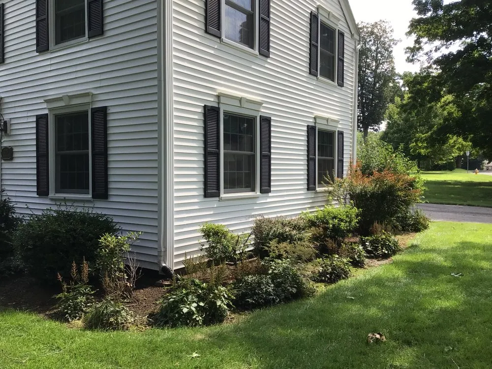 Trusted lawn mowing service for residential properties in Springfield, MA by Perez Landscaping