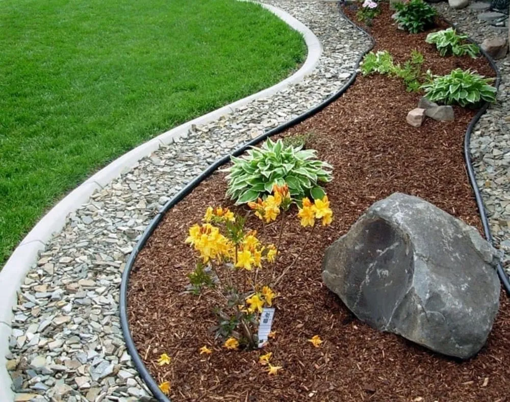 Trusted outdoor landscaping for year-round maintenance in Iowa City, IA by Perez Lawn & Landscaping