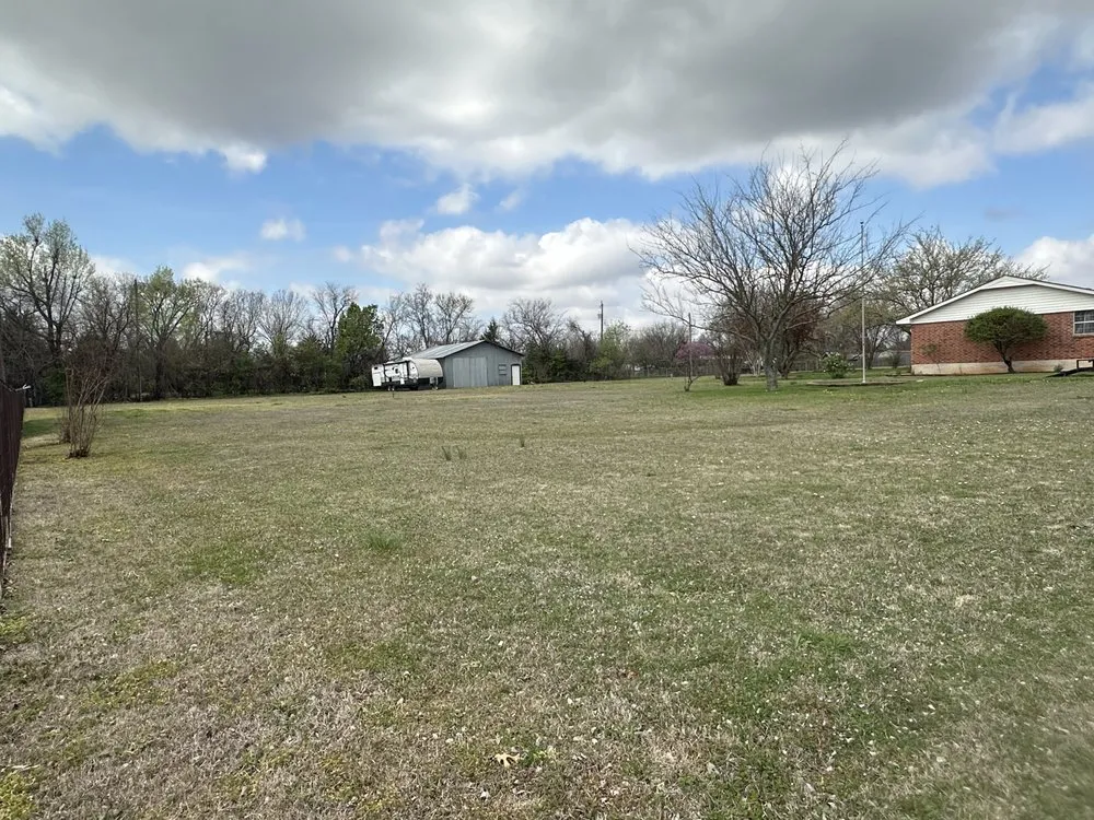 Custom yard cleanup service in Oklahoma City, OK by Perez Lawn Care