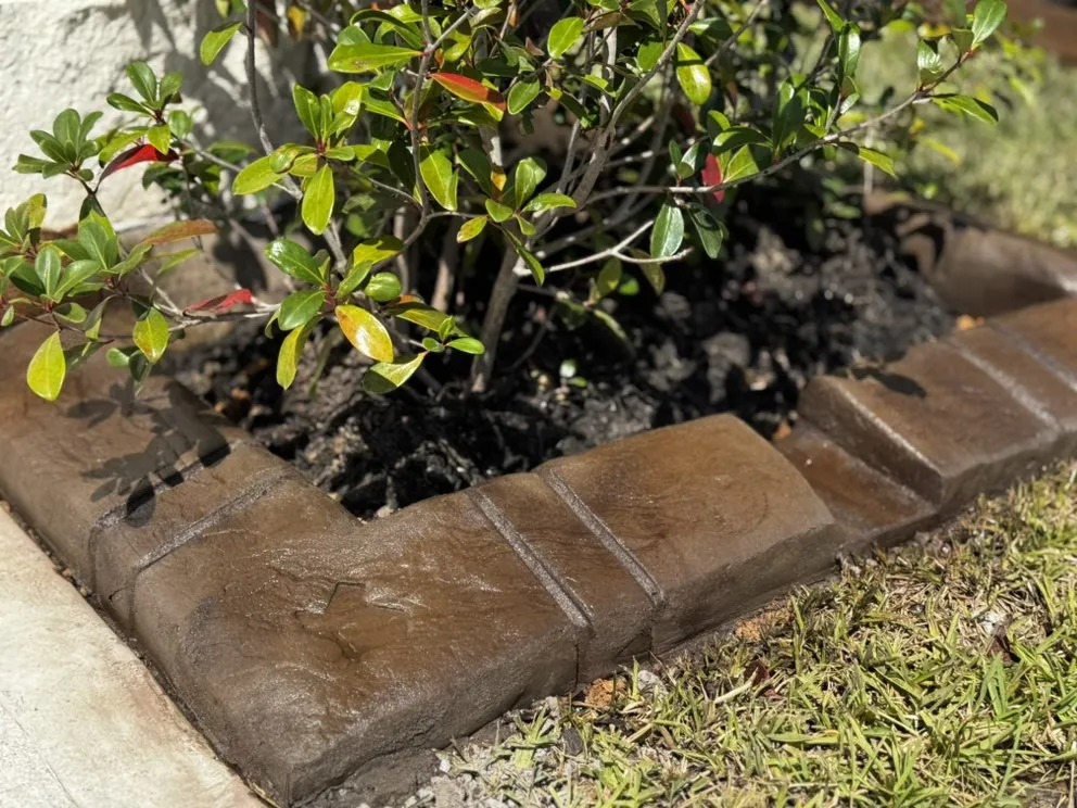 Professional landscape installation with custom design in Needville, TX by Perezidente Elite Services