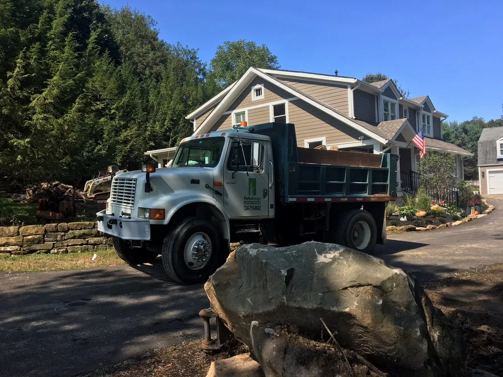 Professional yard cleanup service for homes in Gibsonia, PA by Perfect Image Landscape & Excavation