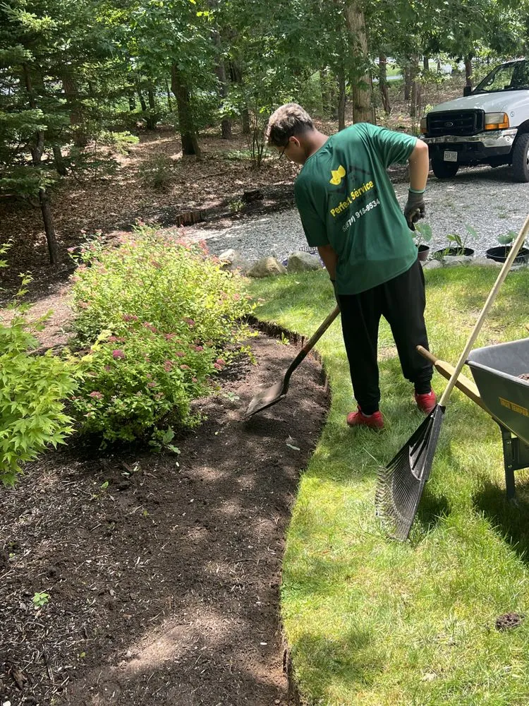 Custom landscape installation for year-round maintenance in Barnstable, MA by Perfect service landscaping