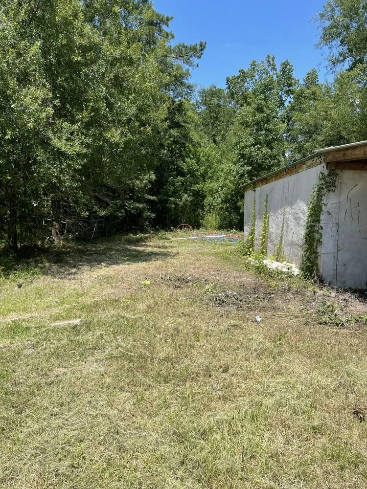 Custom landscape installation in Vidor, TX by Perfection Lawn Management