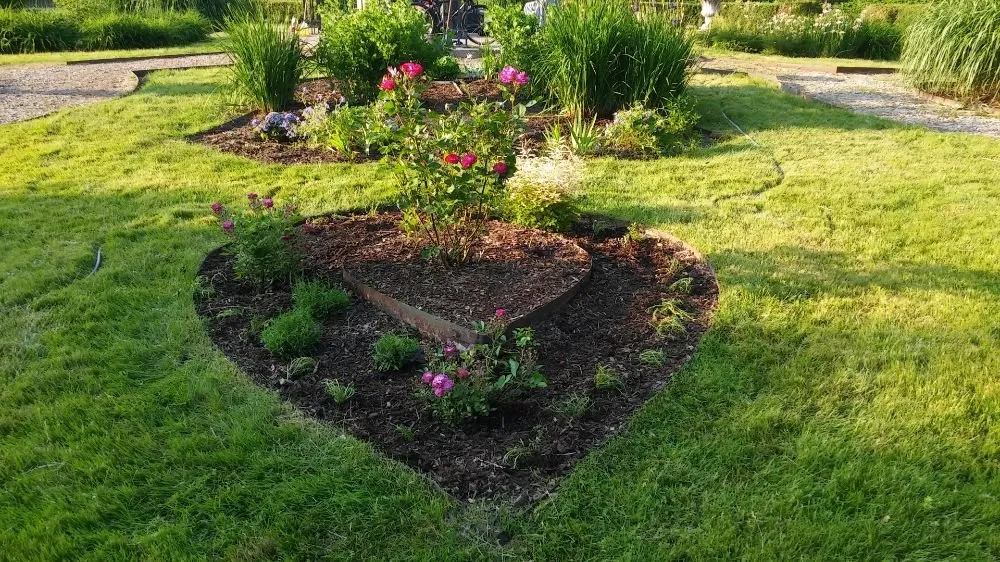 Top-rated lawn mowing service near you in Redford Charter Township, MI by Perfectly Green Landscapeing and Interiors incorperated