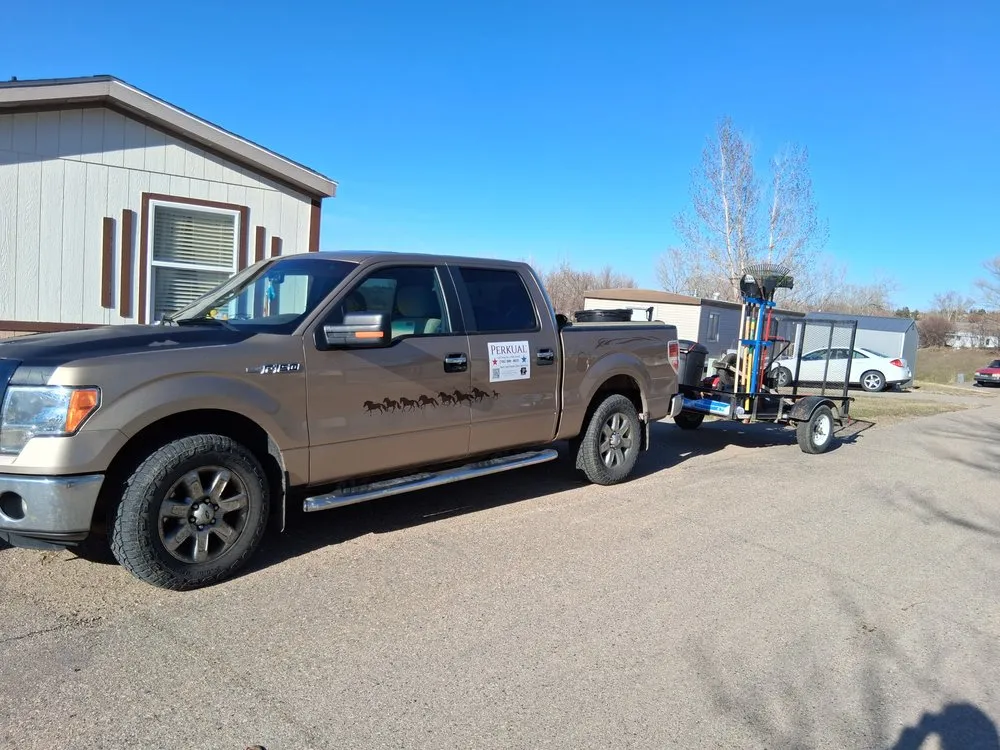 Professional lawn care service for year-round maintenance across Minot, ND - Perkual