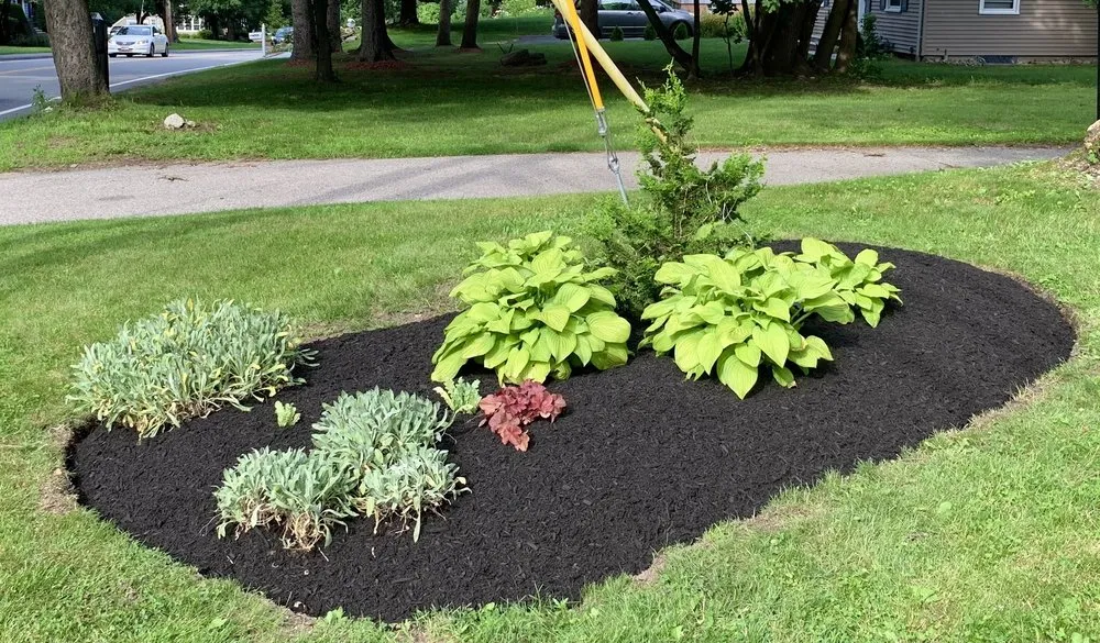 Custom residential landscaping with custom design in Holden, MA by Perrone Landscaping