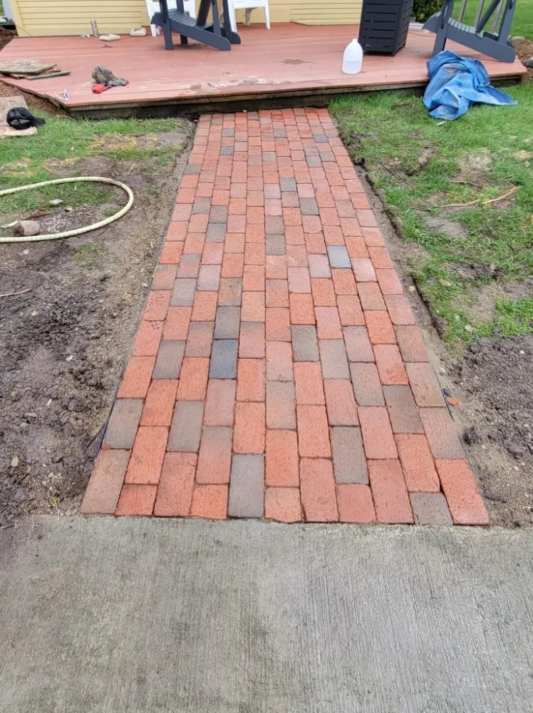 Professional lawn mowing service with custom design in Cement City, MI by Perry's Pinnacle Outdoor Service