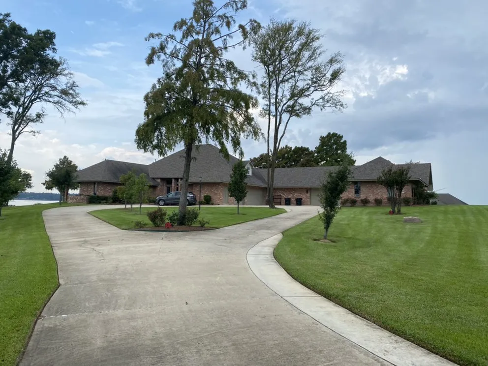 Custom landscape installation for residential properties in Plain Dealing, LA by Perrys professional lawn service