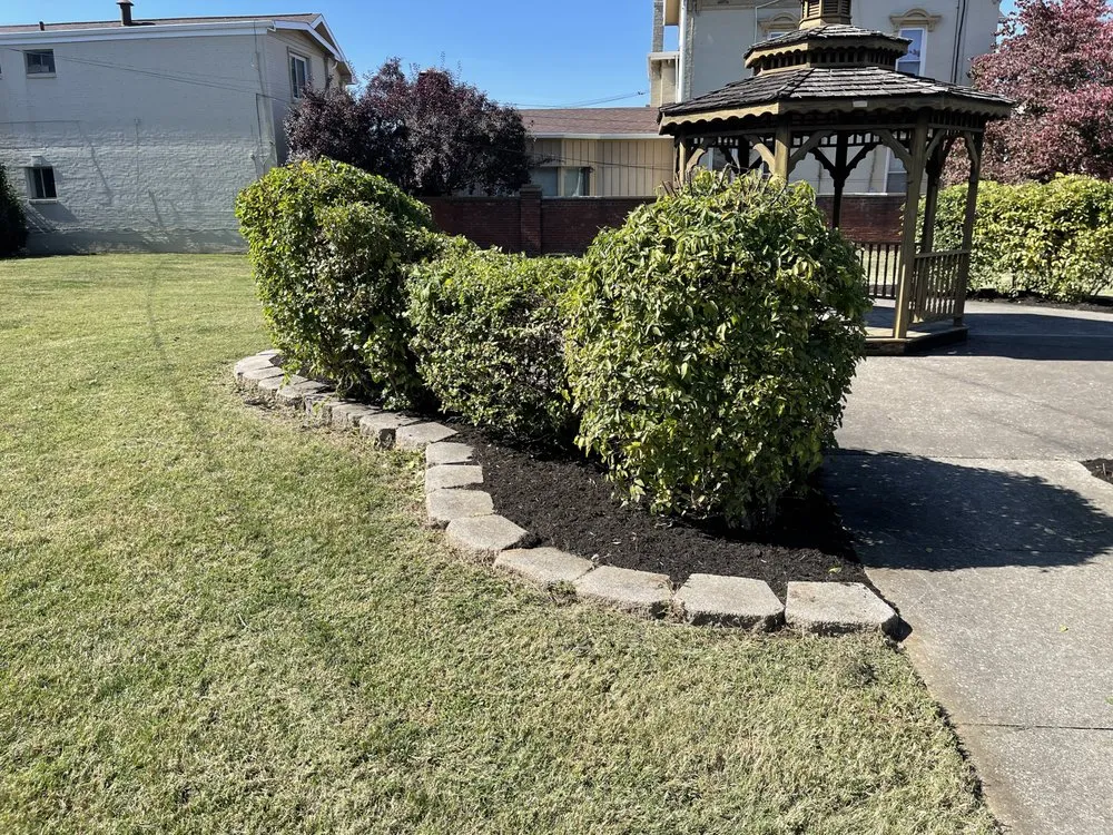 Custom landscape installation with custom design across Owensboro, KY - Personal Touch Property Maintenance