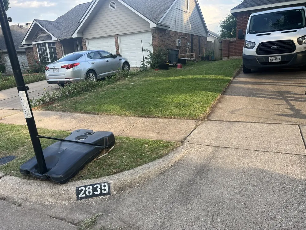 Professional lawn mowing service for homes in Grand Prairie, TX by Pesina Landscaping