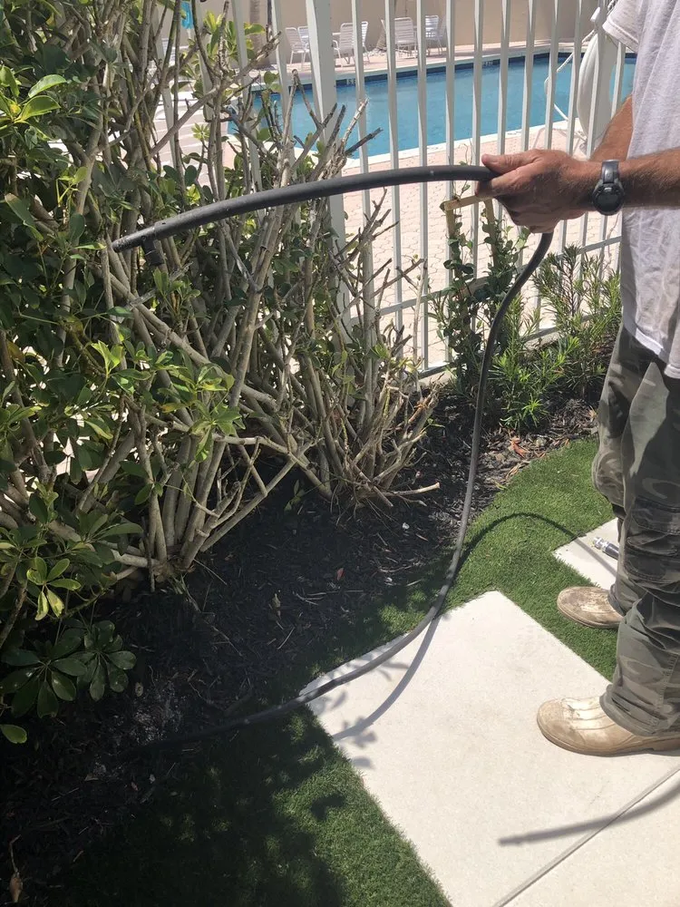 Professional lawn mowing service for year-round maintenance in Jupiter, FL by Peter Kutsukos Landscape