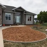 Custom yard cleanup service in West Fargo, ND by Peterson Services. LLC
