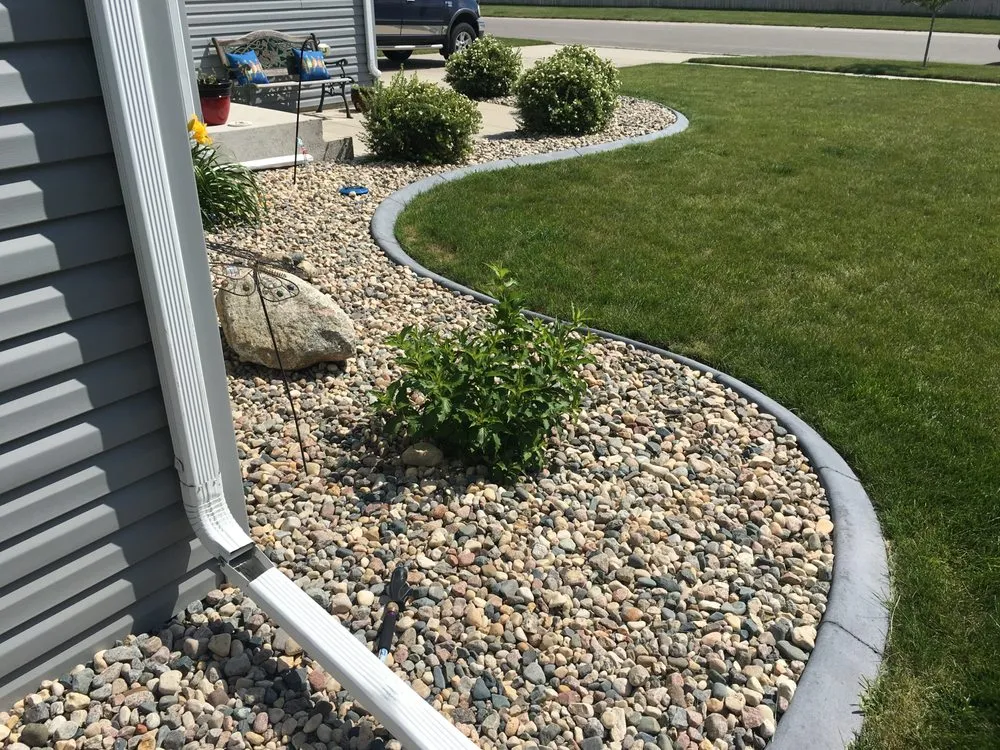 Trusted outdoor landscaping experts serving West Fargo, ND - Peterson Services. LLC
