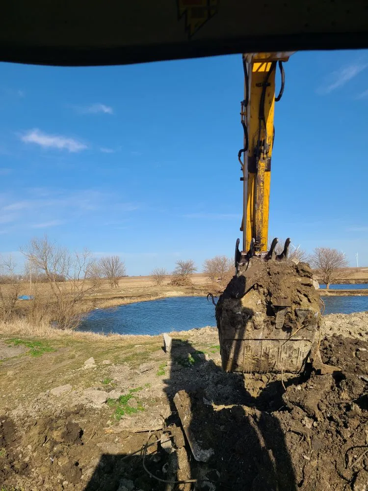 Custom landscape installation in Chenoa, IL by Petree Farms Demolition & Excavation