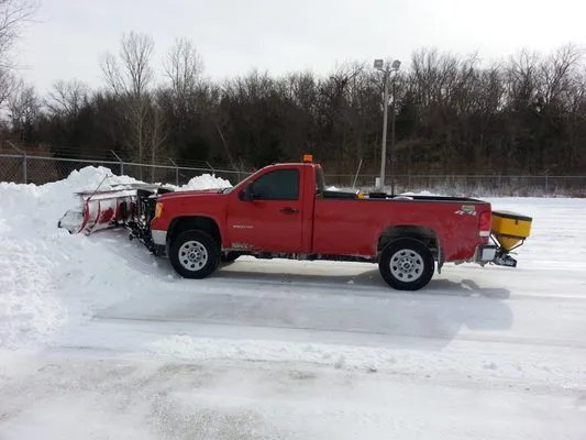 Pettigrew's Lawn Landscaping & Snow Removal Logo