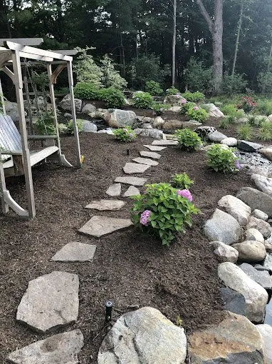 Custom landscaping services for beautiful yards in Macomb, MI by Peytom Maintenance