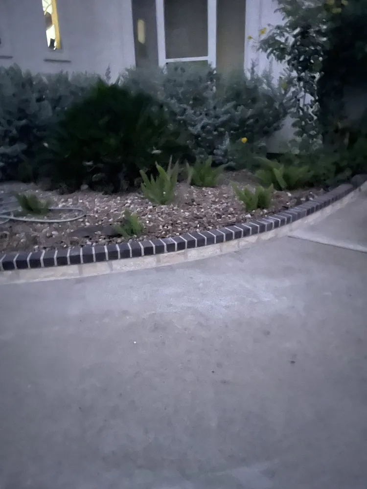 Custom landscape installation in Converse, TX by PGT&V Lawn Care & Landscapping