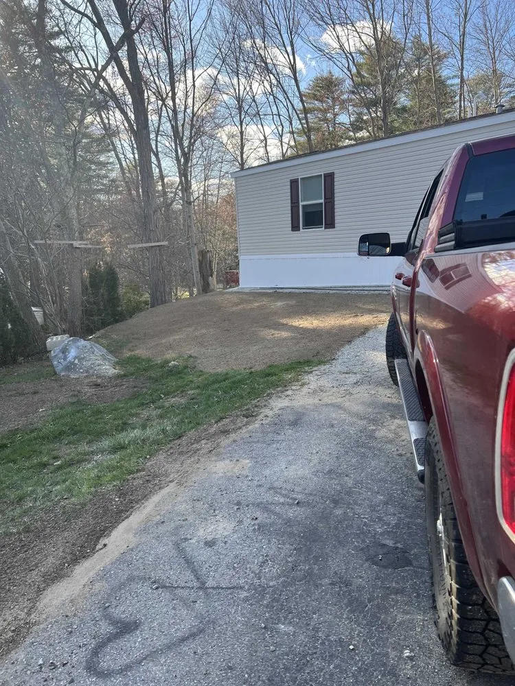 Professional lawn mowing service for year-round maintenance in Barnstead, NH by Phantom Acres