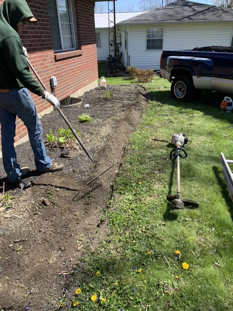 Affordable lawn mowing service for year-round maintenance in Muncie, IN by Phil's Lawn Service