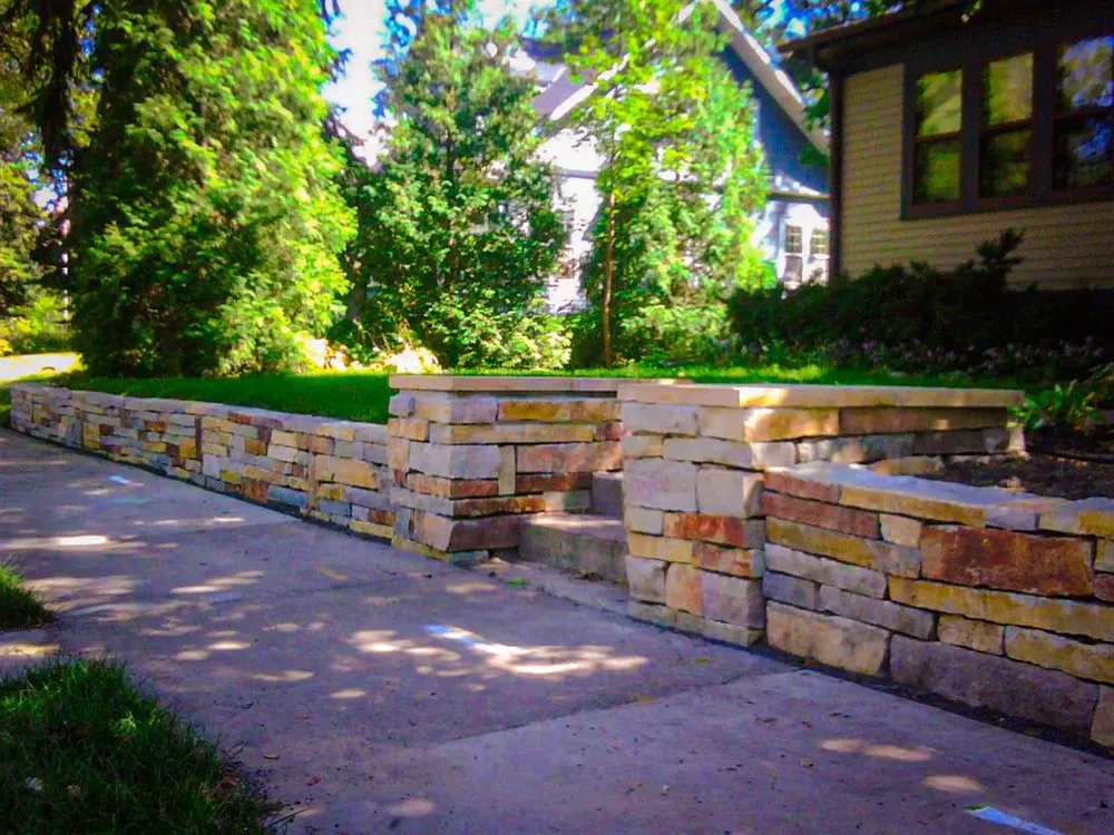 Local landscape design for year-round maintenance in Maplewood, MN by P.H.M. Incorporated