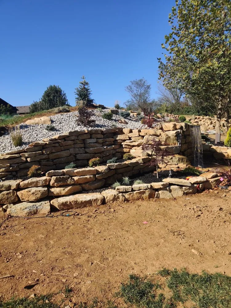 Top-rated landscaping services with custom design in Taylorsville, KY by Phoenix Property Solutions