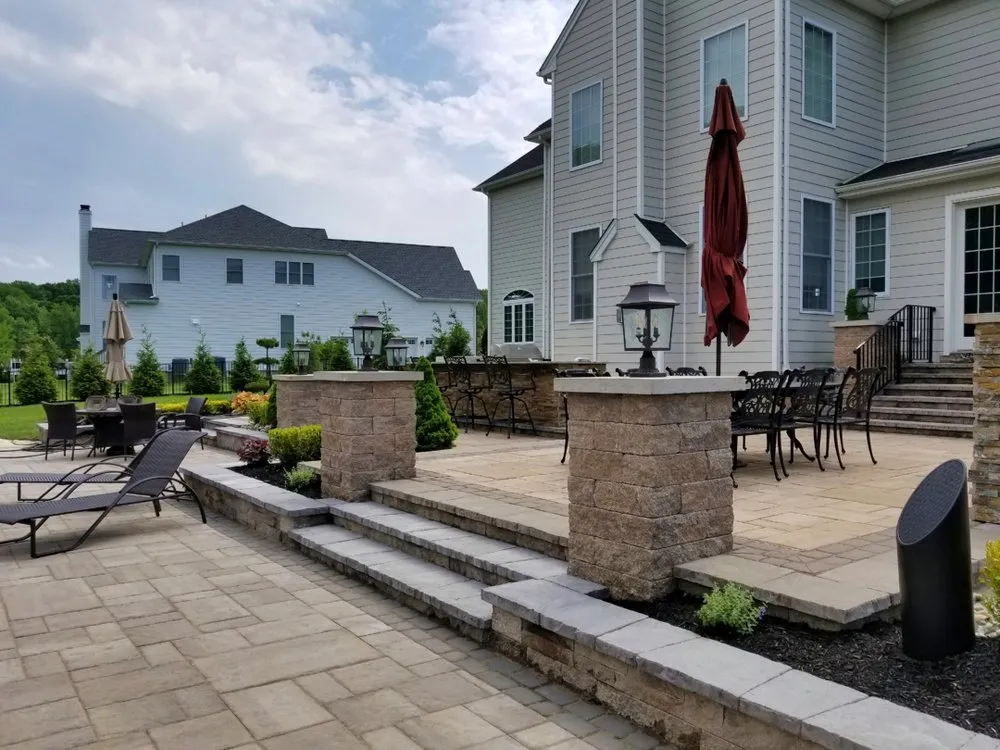 Custom landscape design for residential properties in Manalapan, NJ by Picture Perfect Landscaping