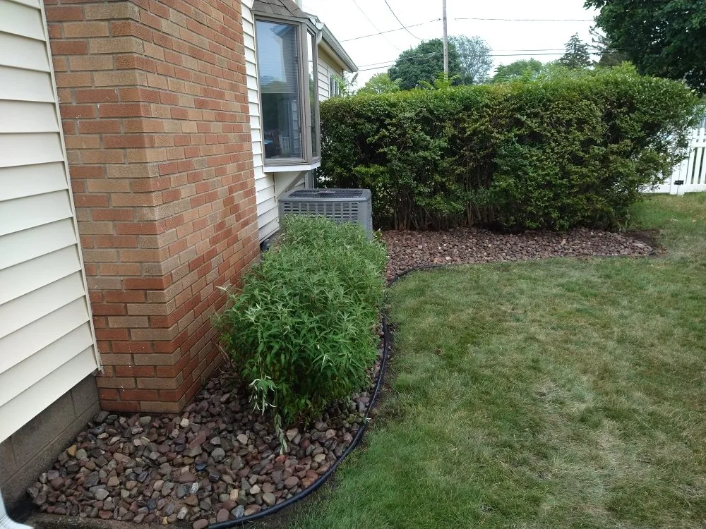 Professional garden landscaping for year-round maintenance across Irondequoit, NY - Pike's Plowing and Landscape