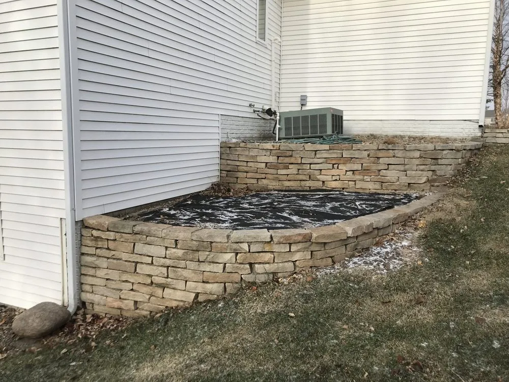 Professional yard cleanup service in WDM, IA by Pilot Landscape Solutions