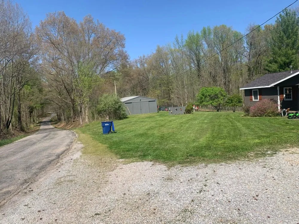Affordable landscape design for residential properties in Omaha, IL by Pilson Prince Lawn Care