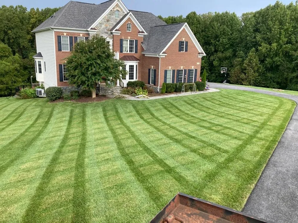 Custom lawn mowing service for residential properties in Columbia, MD by Pineda Landscaping