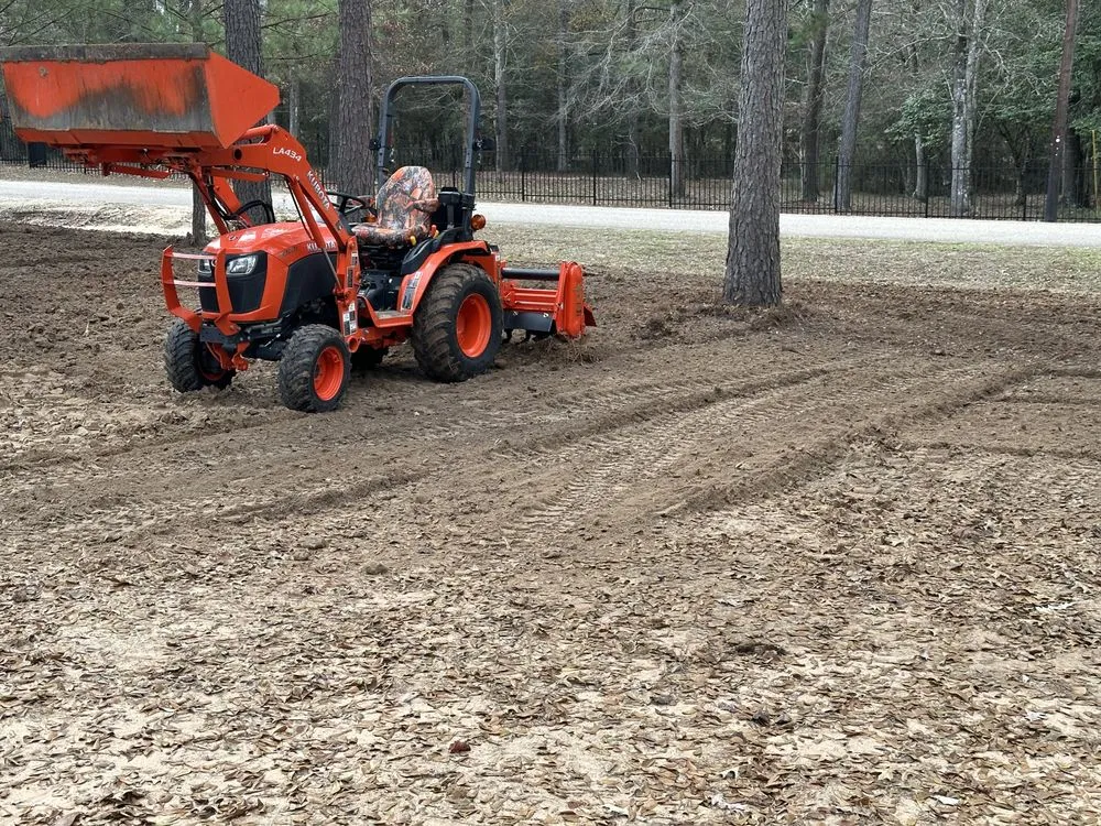 Professional landscape design for year-round maintenance in New Caney, TX by Piney Woods Land Preparation