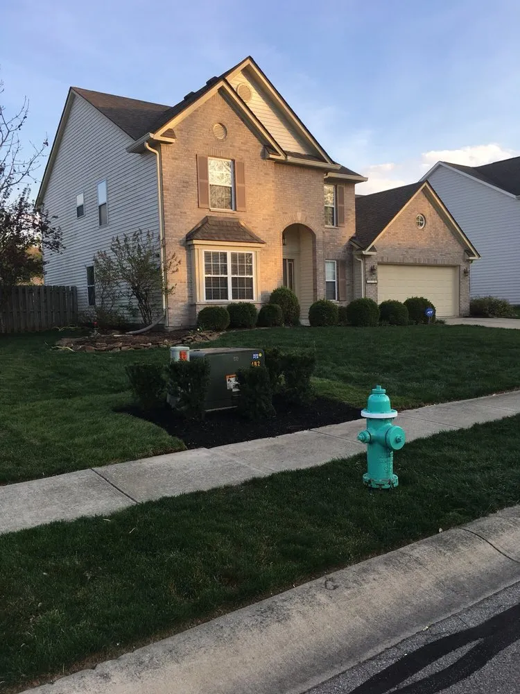 Custom landscape design for residential properties in Indianapolis, IN by Ping's Tree Service