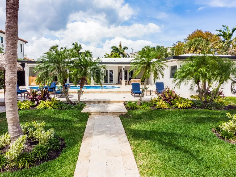 Local yard maintenance with custom design in Southwest Ranches, FL by Pink and Green Lawn Care and Landscape