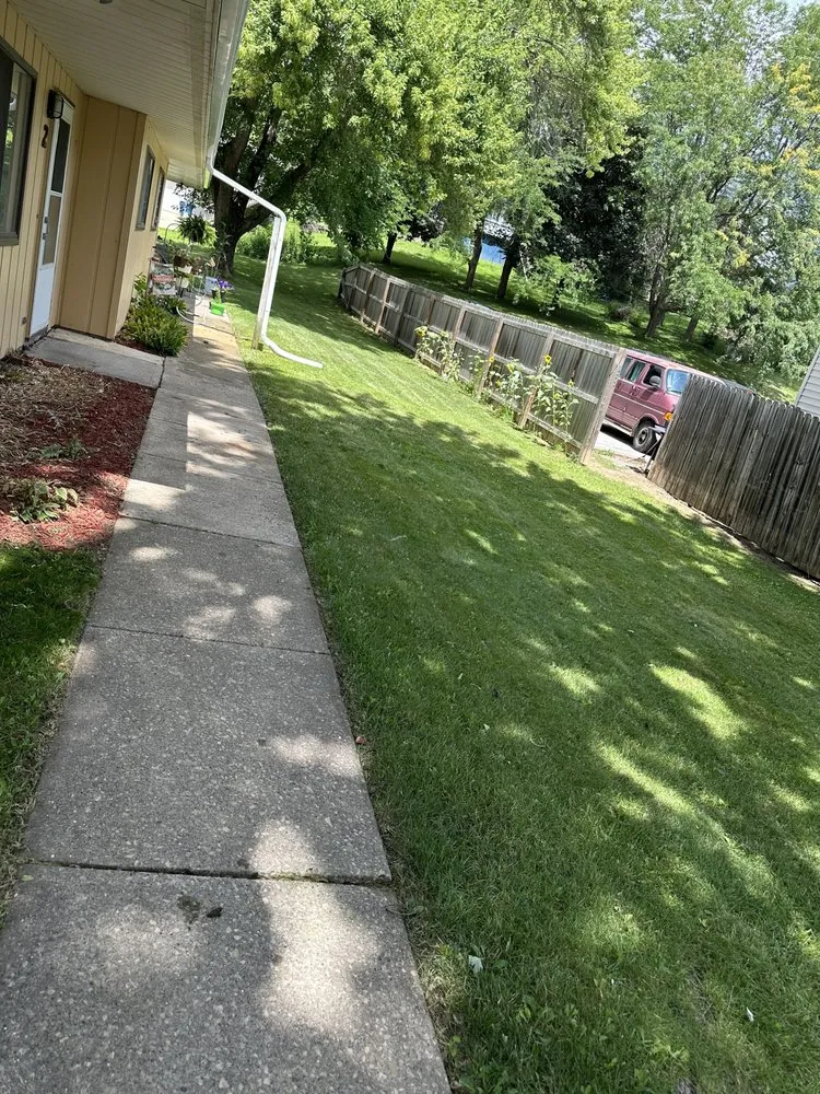 Custom yard cleanup service for beautiful yards in Moline, IL by Pinkies Lawn Care