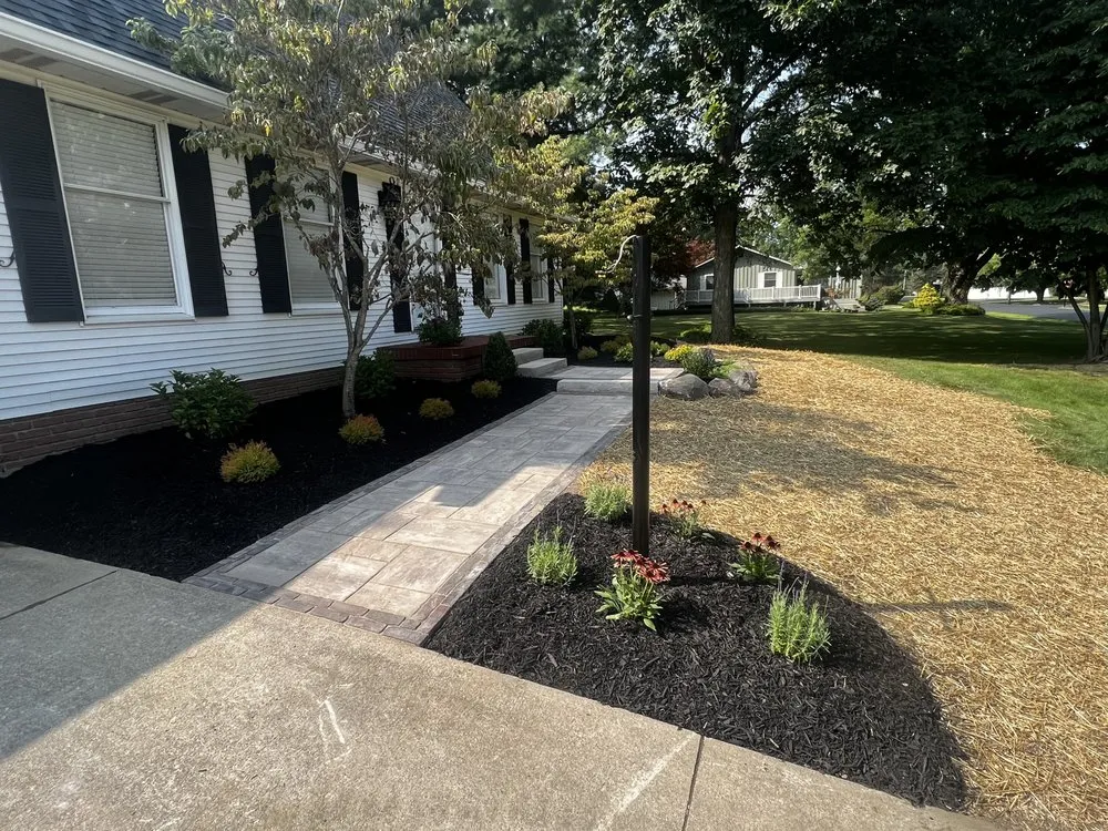 Custom yard maintenance for residential properties in Akron, OH by Pino's Landscaping