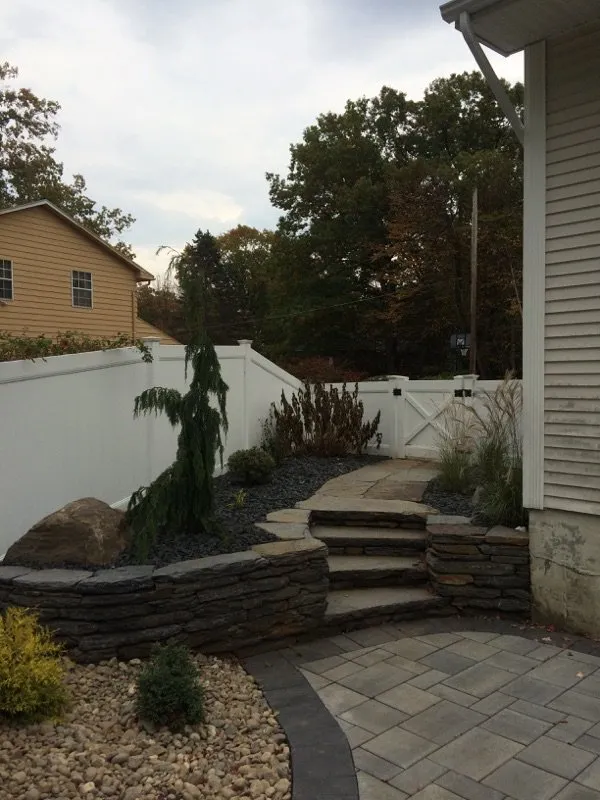 Custom yard cleanup service for outdoor upgrades in Easthampton, MA by Pioneer Landscapes
