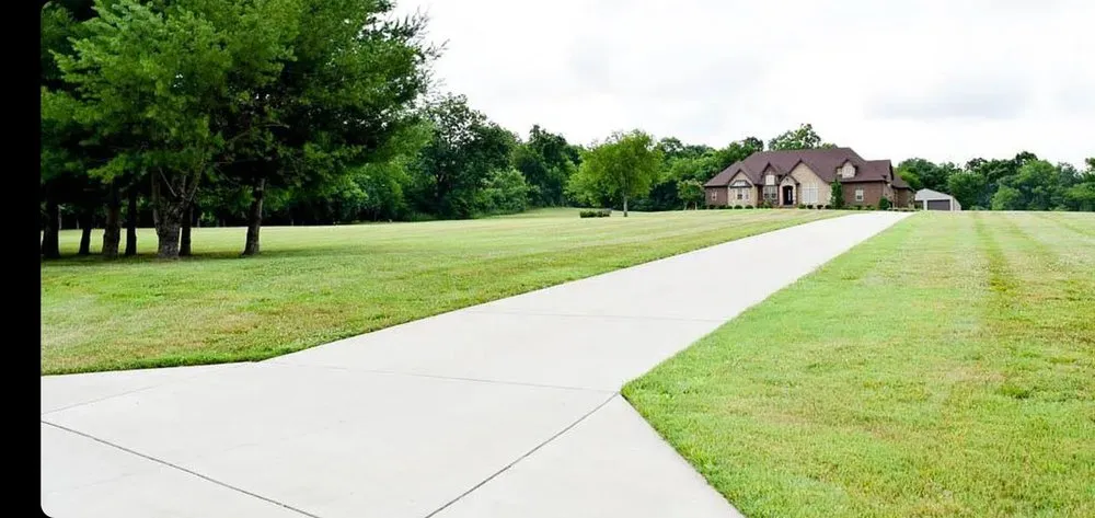 Custom lawn care service for residential properties in Bethpage, TN by Pioneer Lawn Care