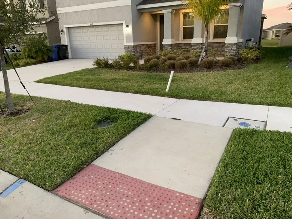 Custom landscape design in Apollo Beach, FL by Pirate’s Cove Lawn Maintenance