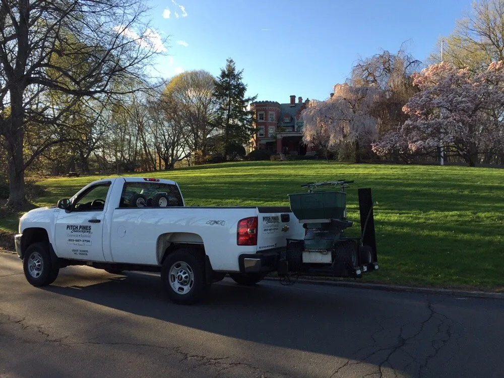 Affordable lawn care service for year-round maintenance in North Haven, CT by Pitch Pines Landscaping